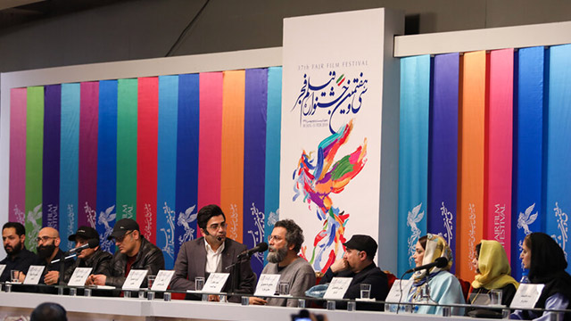 The cast of ‘Takhti, the World Champion’ attends a news conference on the first day of the 37th Fajr film festival.