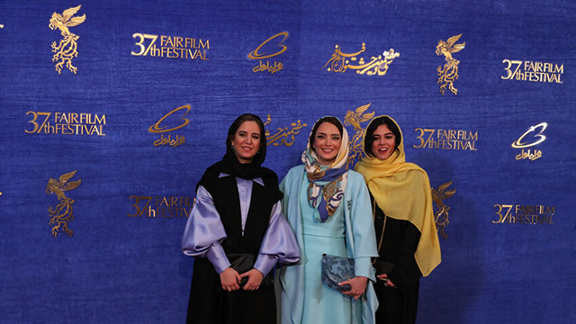 The cast of ‘Takhti, the World Champion’ attends the first day of the 37th Fajr film festival.
