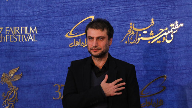 Shahram Haqiqatdoust, the star of ‘Reverse’, attends the first day of the 37th Fajr film festival.