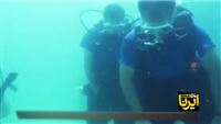 Iran war veterans pray underwater