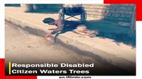 Responsible disabled citizen waters trees