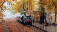 Iran’s railway station in autumn leaves