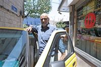 Iran taxi driver gives free ride