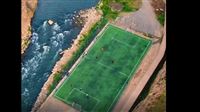 Soccer field embedded in nature